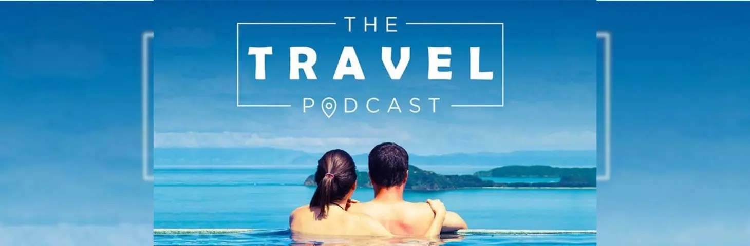 Not Just Travels The Travel Podcast banner featuring a couple in an infinity pool looking over the coastline