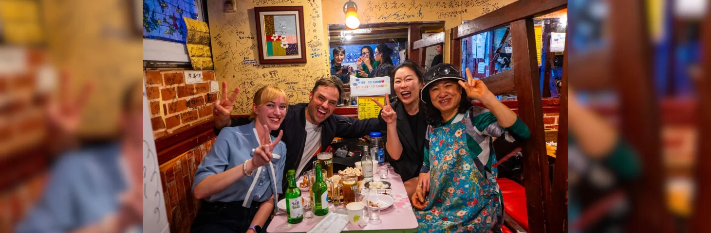 InsideAsia tour reps in a restaurant in South Korea.
