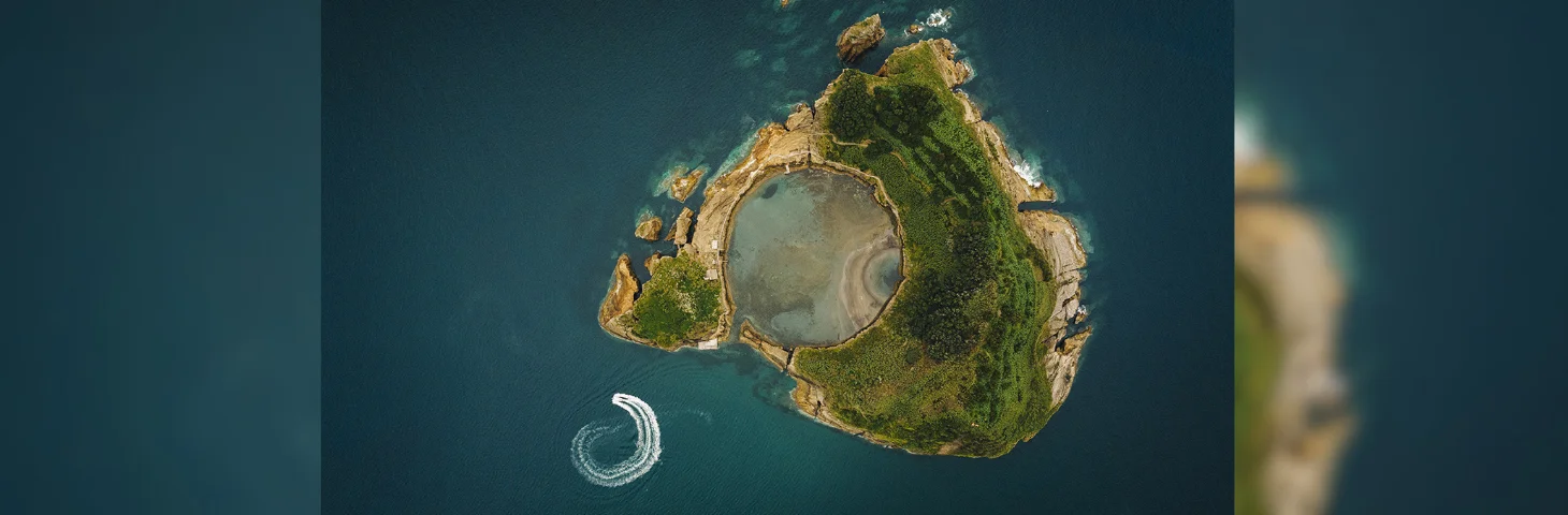 Aerial view of Islet Vila Franca, a small volcanic island over the south coast of the Azores.