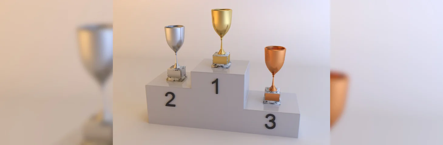 A three-tiered trophy podium