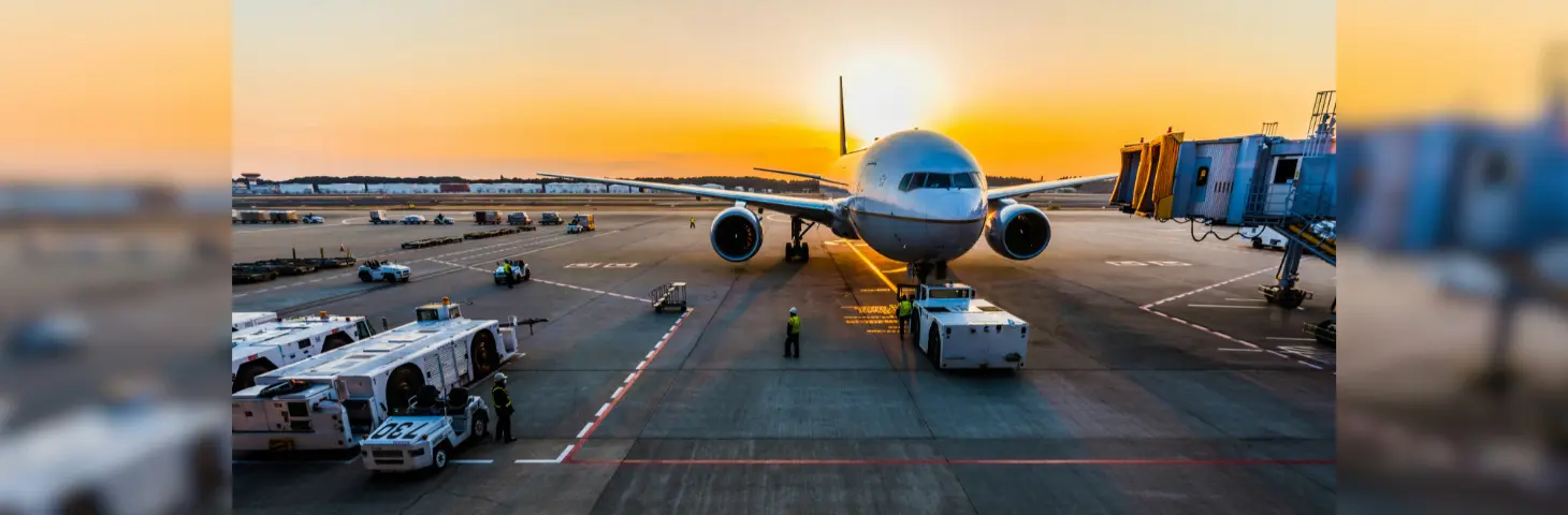 Image of a plane departing an airport