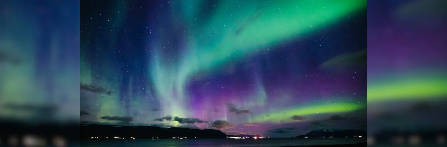 The Aurora Borealis over the bay in Scotland.