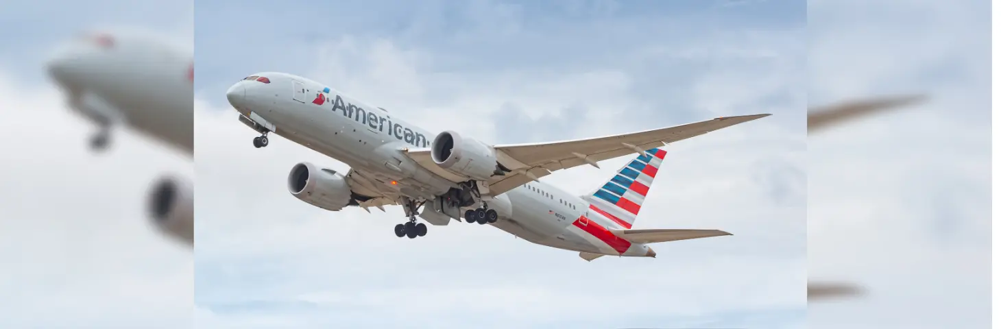 Image of an American Airlines plane in flight. 