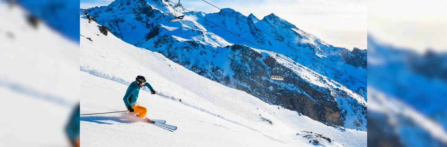 Image of a man skiing on the French Alps. 