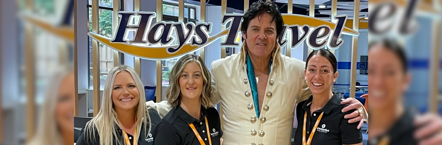 An Elvis impersonator posing with Hays Travel agents at the company's HQ in Sunderland. 