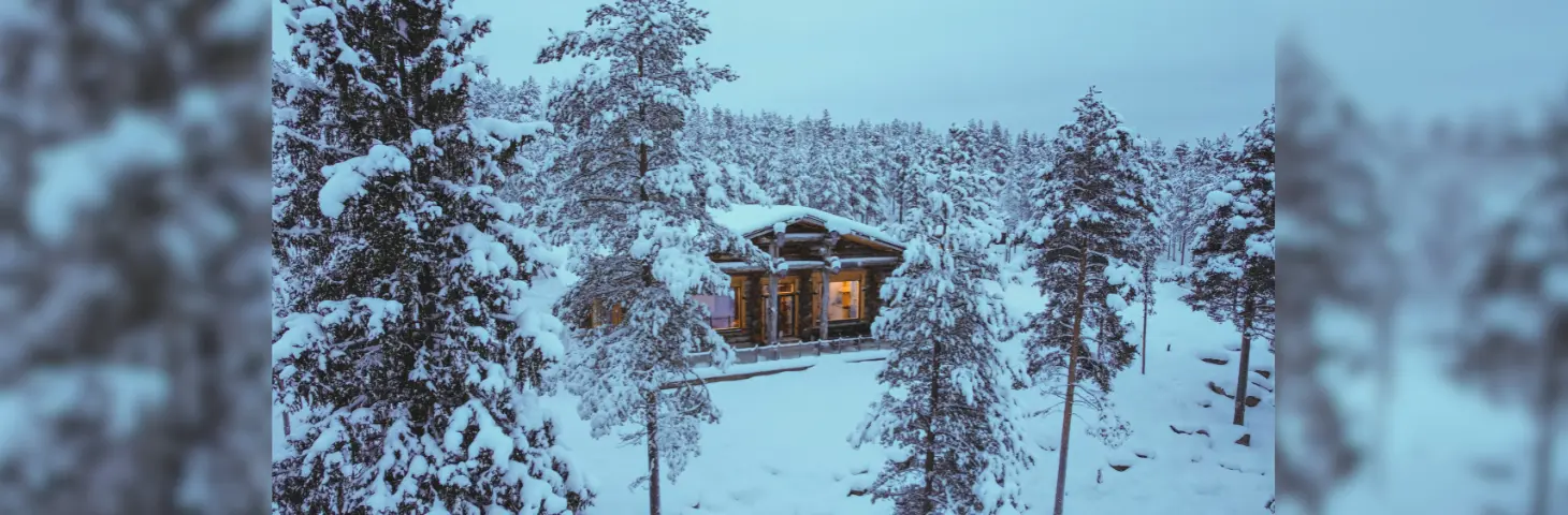 Image of a lodge in a snowy landscape