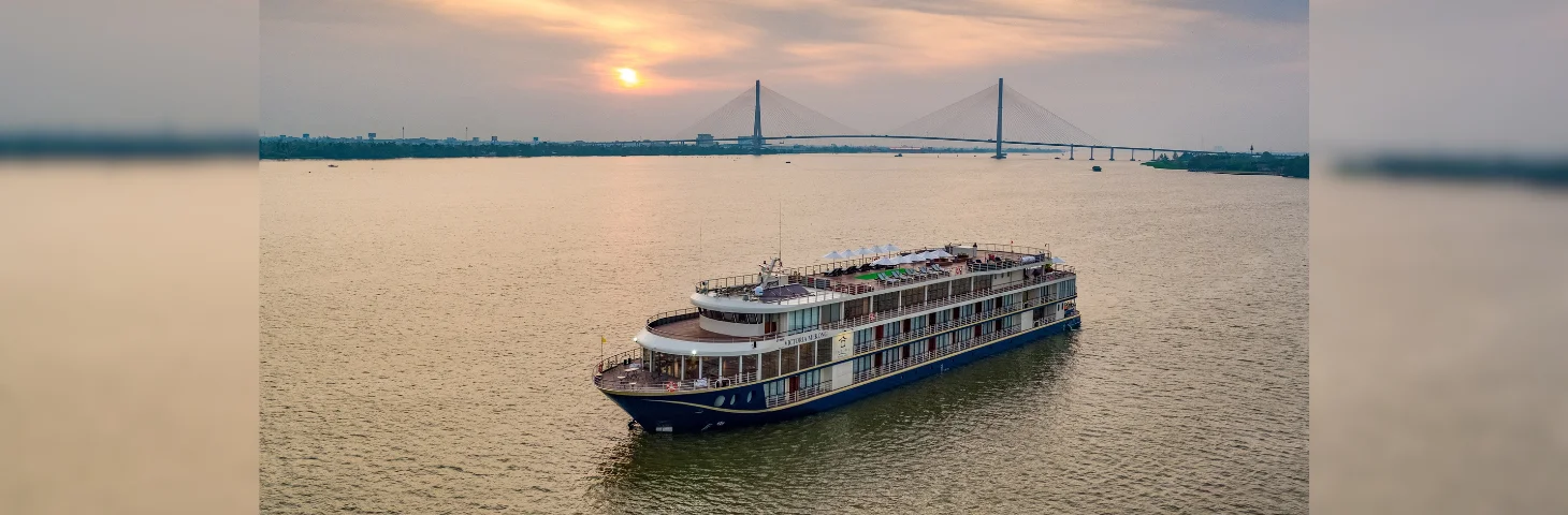 Victoria Mekong sailing on the Mekong River in the late evening.