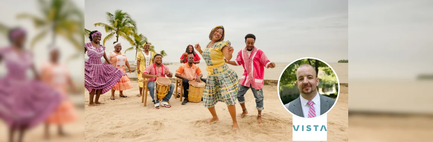 Folks dancing at a Caribbean beach festival overlaid with Rob Kendall headshot and Vista logo.