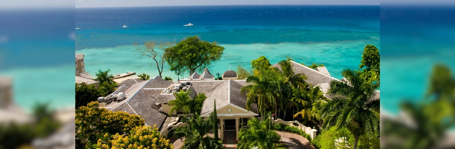 An aerial view of Sandals Royal Plantation, Jamaica, overlooking the sea.