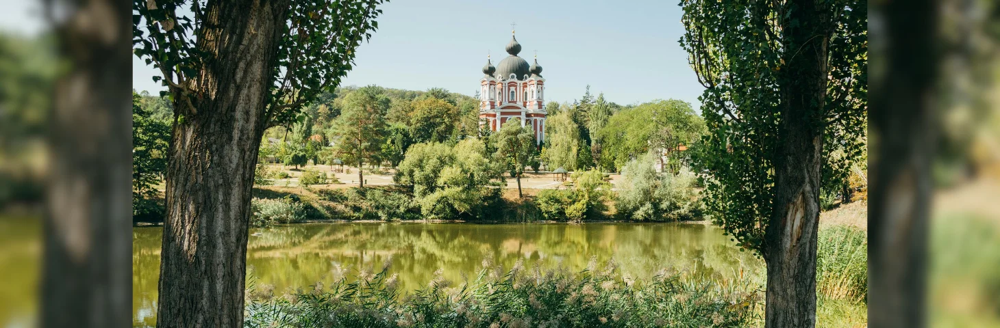 The view over a lake to the Monastery Curchi in Moldova.