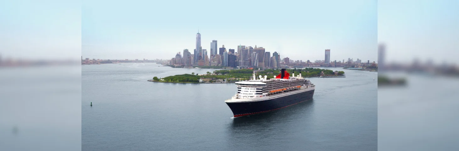 Queen Mary 2 sailing past Manhattan, New York.