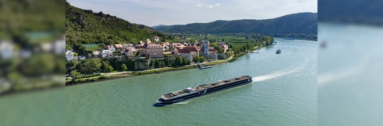 Travelmarvel Vega sailing past Durnstein Town on the Danube river.