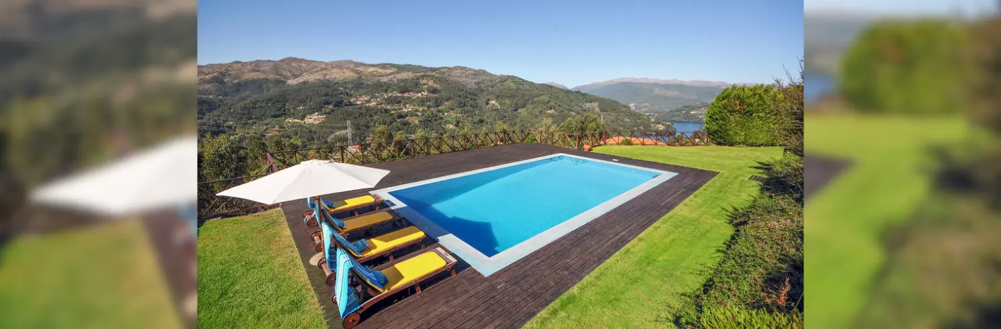 A pool against a rugged hillside backdrop taken at Villa Geres in the Costa Verde