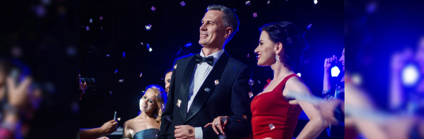 Image of a couple at a gala ceremony in black tie dress