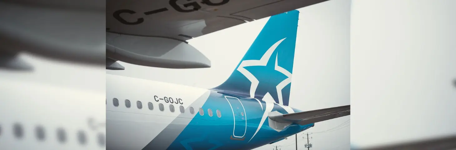 Image of an Air Transat plane's tail and wing