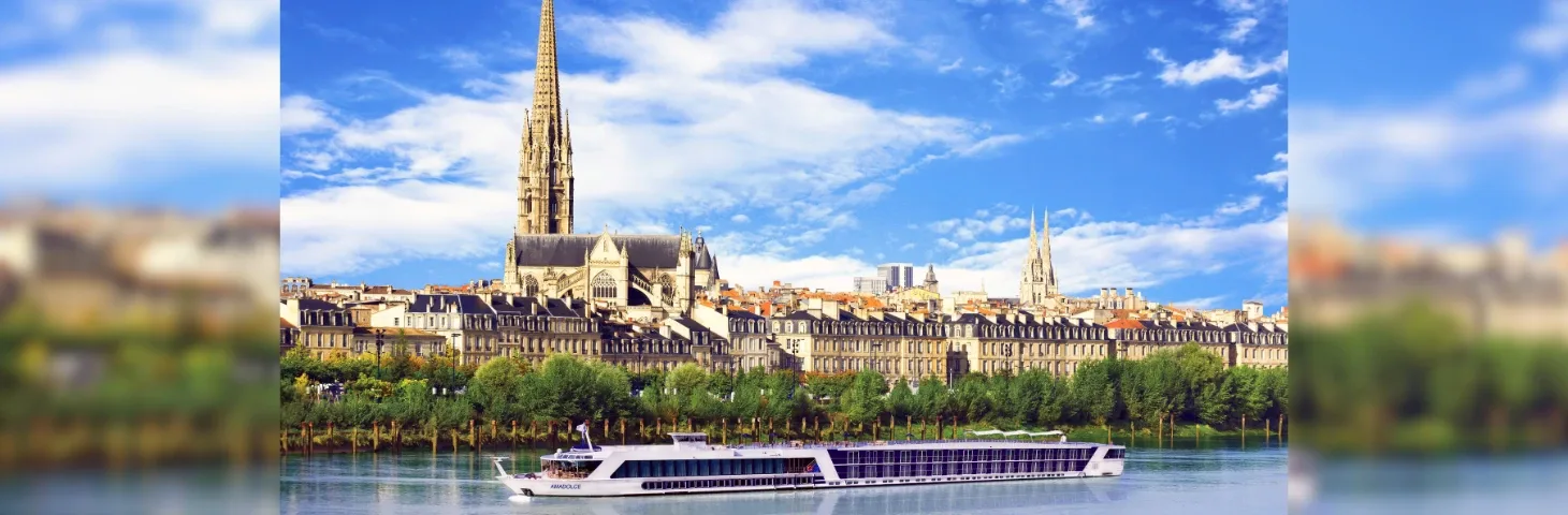 AmaDolce sailing along a river 