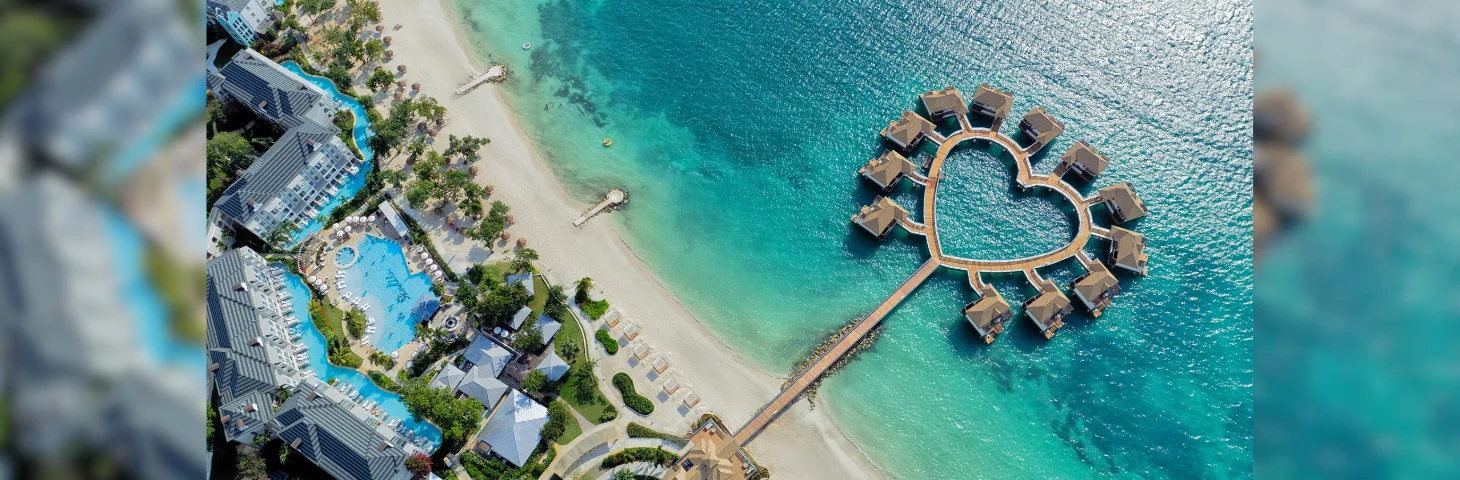 Overwater villas shaped like a heart at Sandals South Coast.