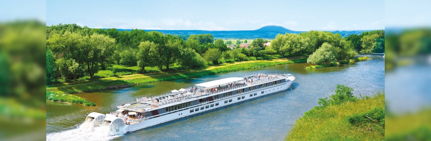 The MS R.E. Waydelich L.J., a paddlewheel ship operated by CroisiEurope, sailing along the Seine.