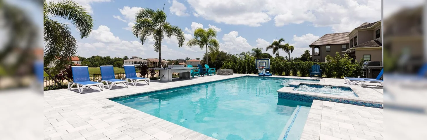 The pool area at The Bohemian Chic Oasis, a villa in Reunion, Florida.