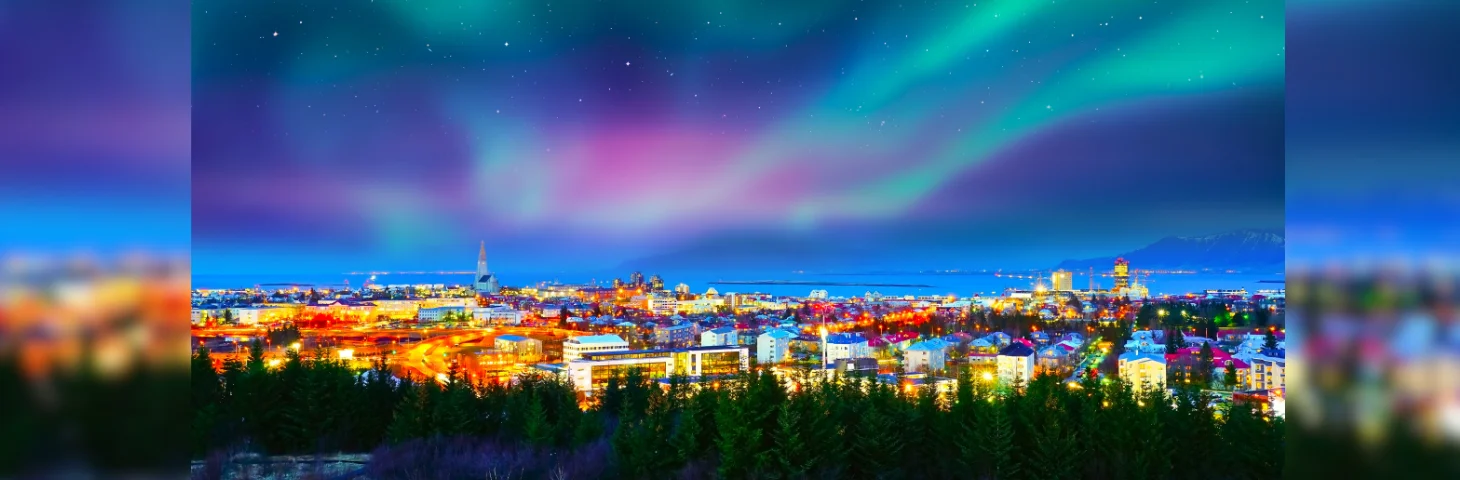 The Northern Lights over Reykjavik, Iceland.
