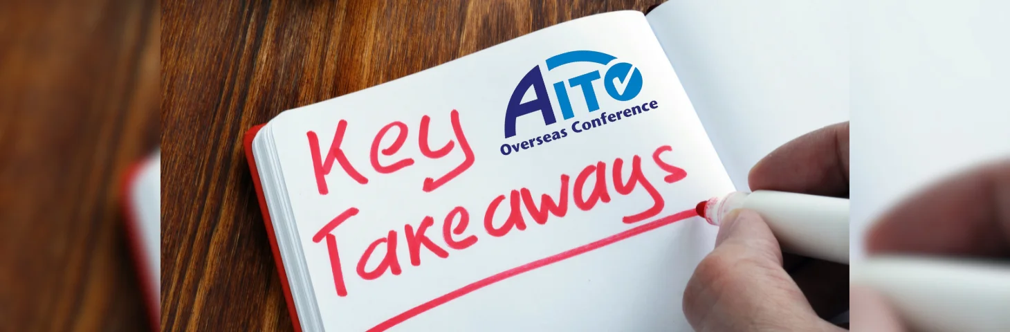 A notepad on a wooden table with 'Key Takeaways' written in red marker.
