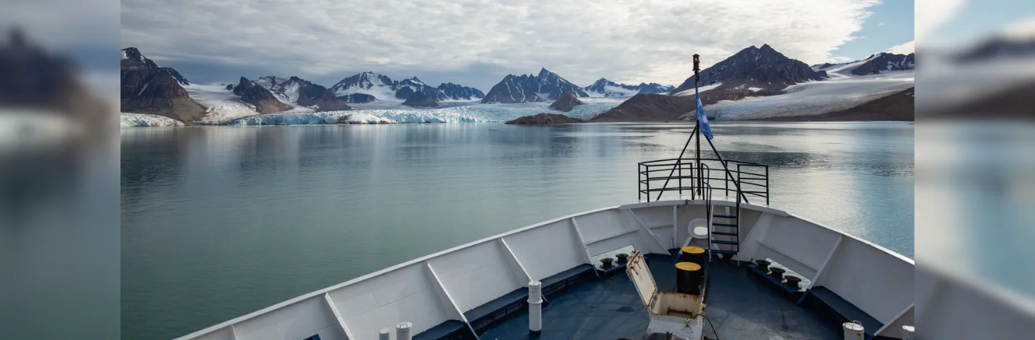 The hull of Svalbard Explorer sailing in the Arctic.