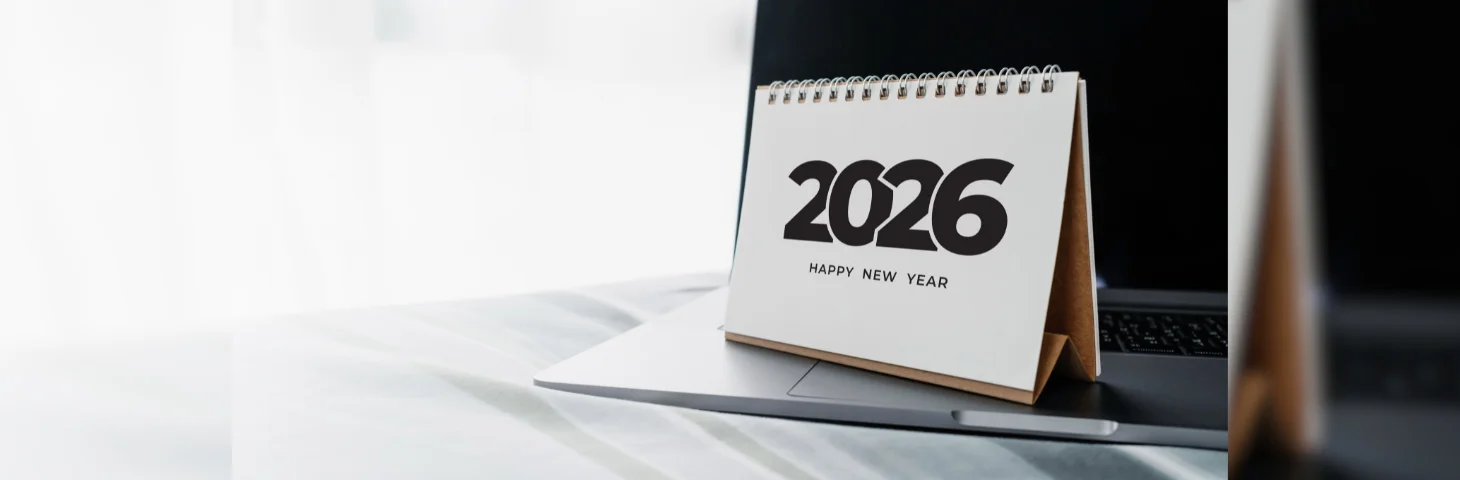 A 2026 calendar resting on an Apple Macbook.