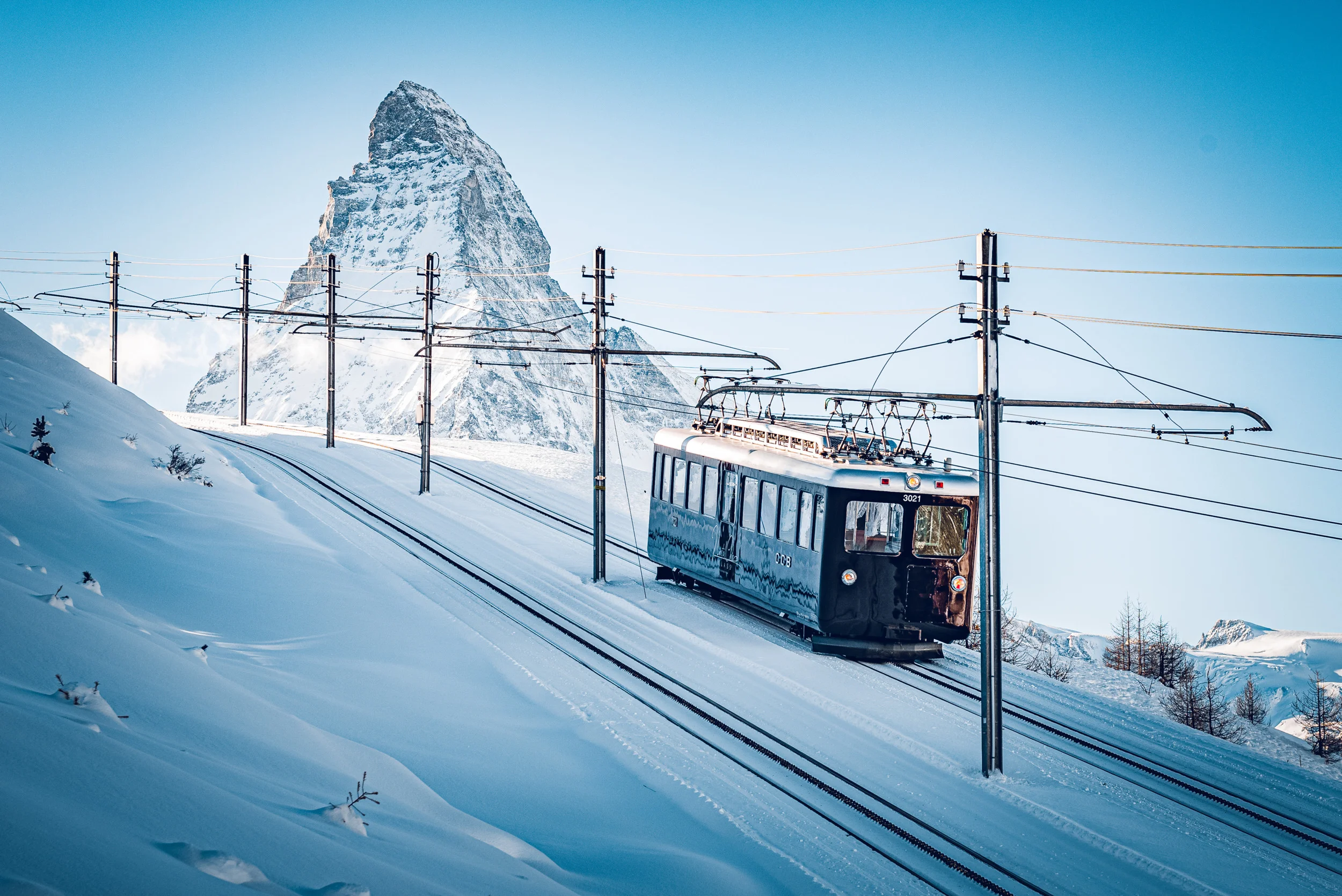The Gornergrat Railway with the Matterhorn mountain in the background. 