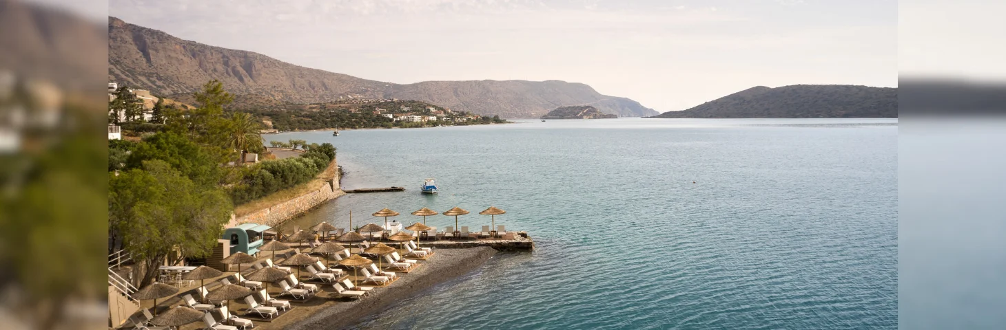 The beachfront area at Domes Aulūs Elounda.