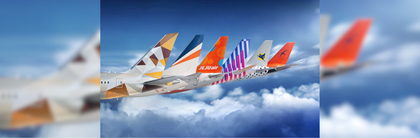 Tails of five aeroplanes.
