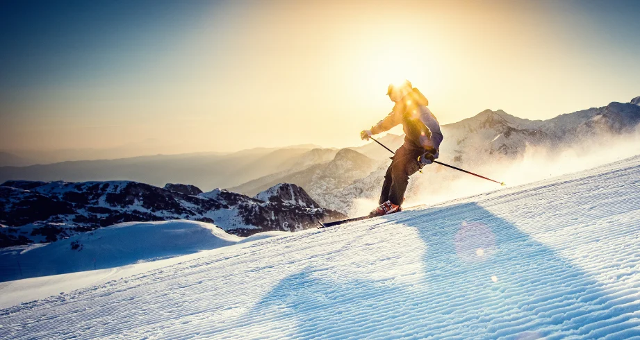 Person skiing on a light incline.