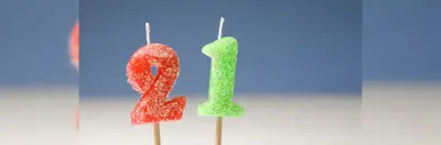 A red '2' candle next to a green '1' candle.
