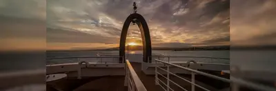 The view from the deck of a Swan Hellenic ship at sunset.