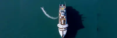 A bird's eye view image of a Swan Hellenic vessel in the sailing