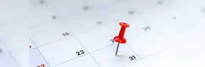 A calendar with a red pin in the 31st. 