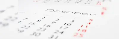 A calendar open on the October page.
