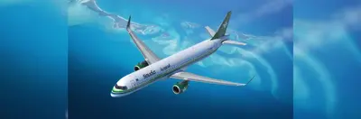 Image of a Saudia plane flying over the ocean
