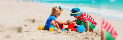 Kids playing in the sand on the beach