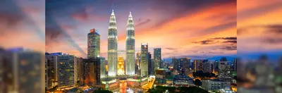 The Kuala Lumpur skyline at sunset.