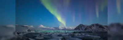 The Northern Lights over Svalbard, Norway.