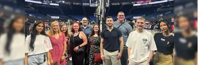 Travel agents and representatives from Visit Orlando at the Kia Center, the home of Orlando Magic.