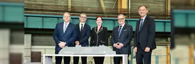 Senior leaders from Celebrity Cruises, announcing the latest Edge Series ship in France.