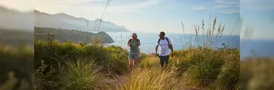 Two people hiking on a scenic coastal trail