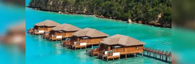 Overwater villas at a Royalton resort.