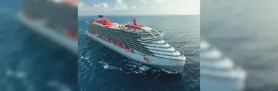  Virgin Voyages' Scarlet Lady sailing through the ocean