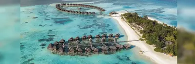 An aerial view of Sun Siyam Olhuveli, a luxury island resort in the Maldives.