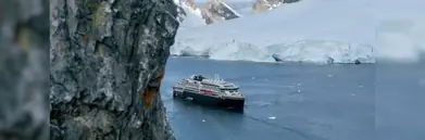 A HX Expedition cruise ship in Antarctica. 