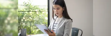 A woman on her ipad.