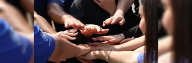 People putting their hands together