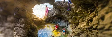 Four people explore shallow-water caves